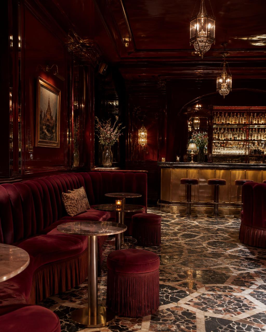 Boutique hospitality lounge in Istanbul with oxblood velvet banquettes